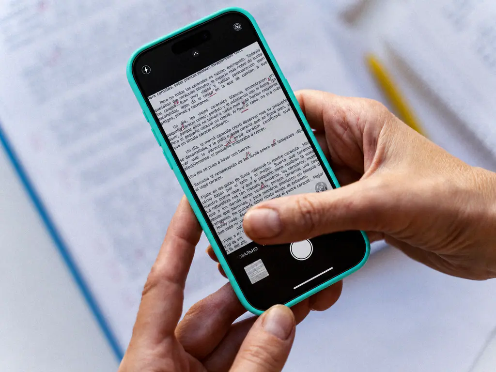 Document imprimé et annoté à la main, capturé au smartphone pour en extraire le texte